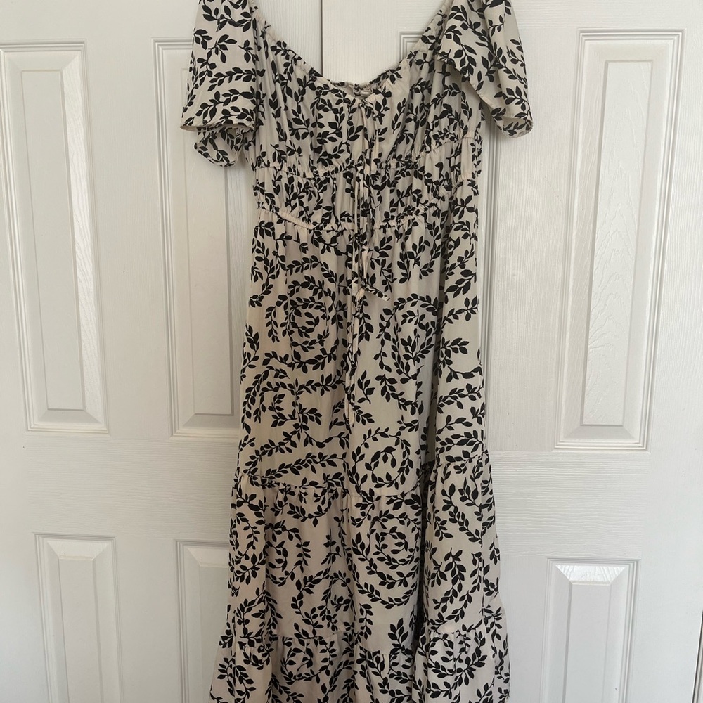 Elegant Black and Cream Floral Dress